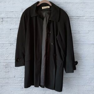 Alfred Dunner black raincoat, hidden buttons, large front pockets.